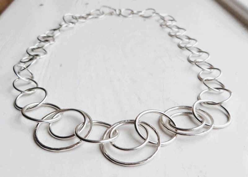 Necklace made from multiple large textured links. Customer says it was a gift for my wife.