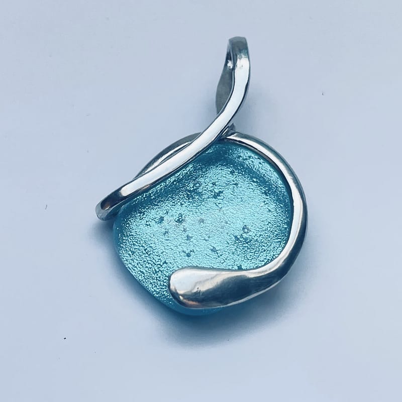 Bright blue dichotic glass and silver pendant